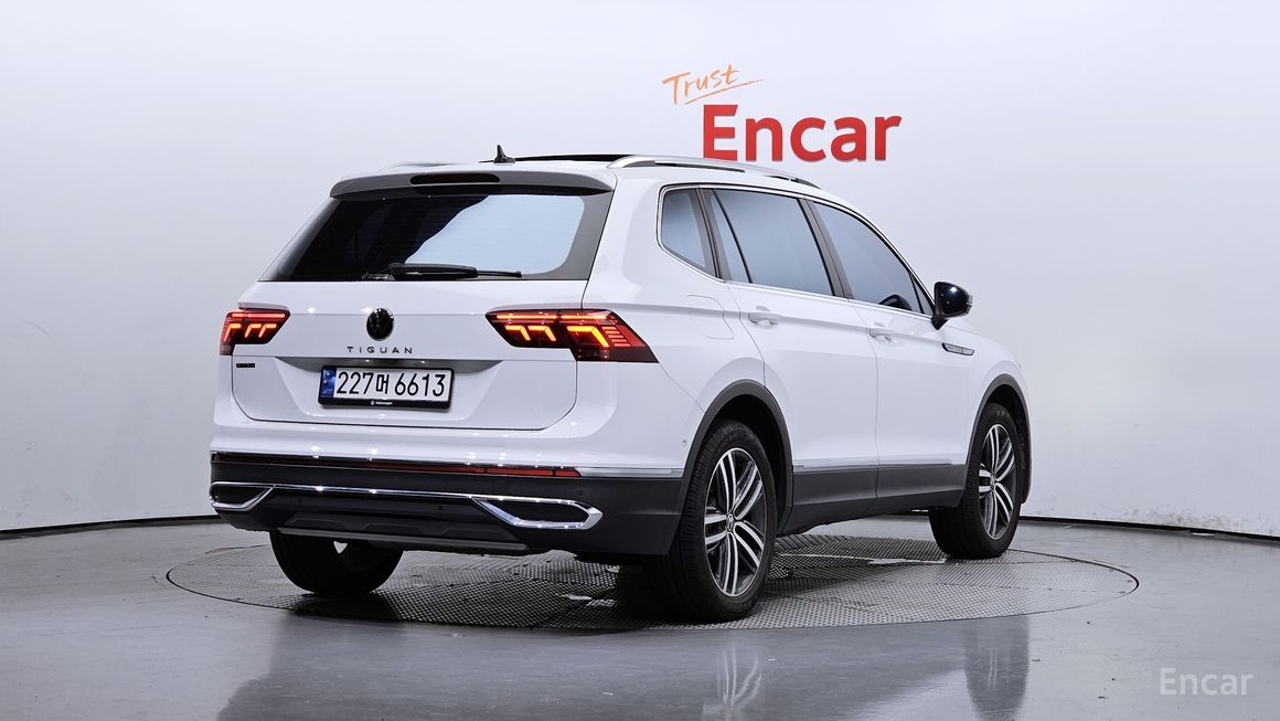 Volkswagen Tiguan - фото 1