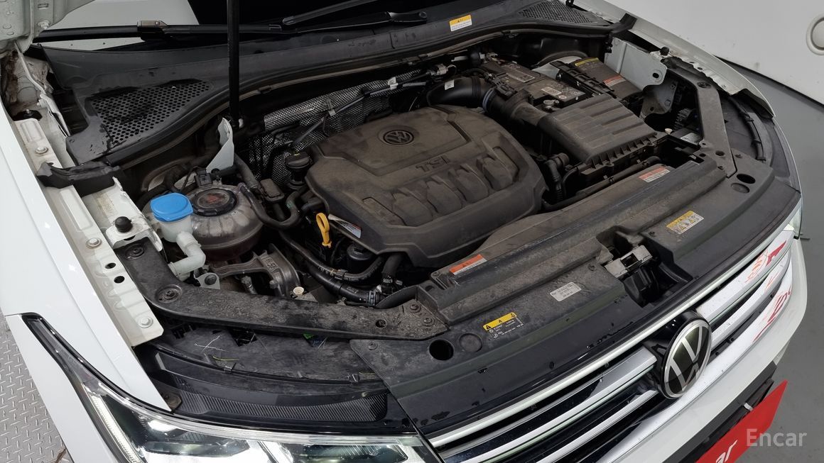 Volkswagen Tiguan - фото 5