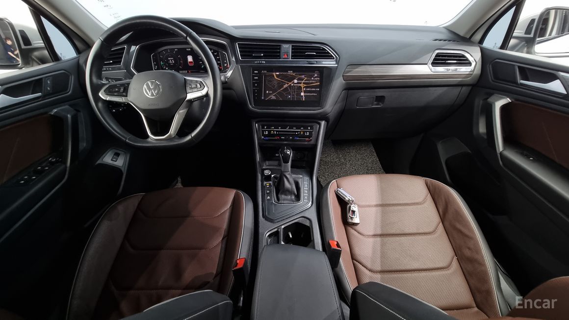 Volkswagen Tiguan - фото 6