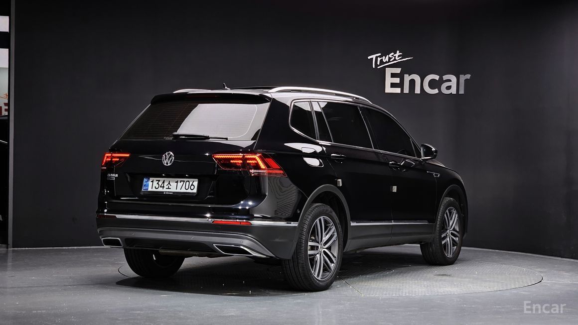 Volkswagen Tiguan - фото 1