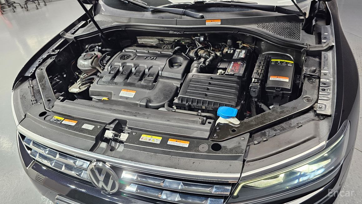Volkswagen Tiguan - фото 5