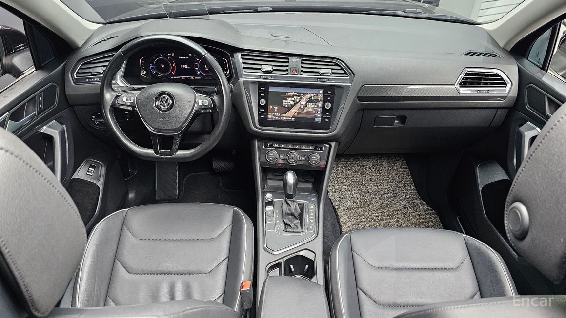 Volkswagen Tiguan - фото 6