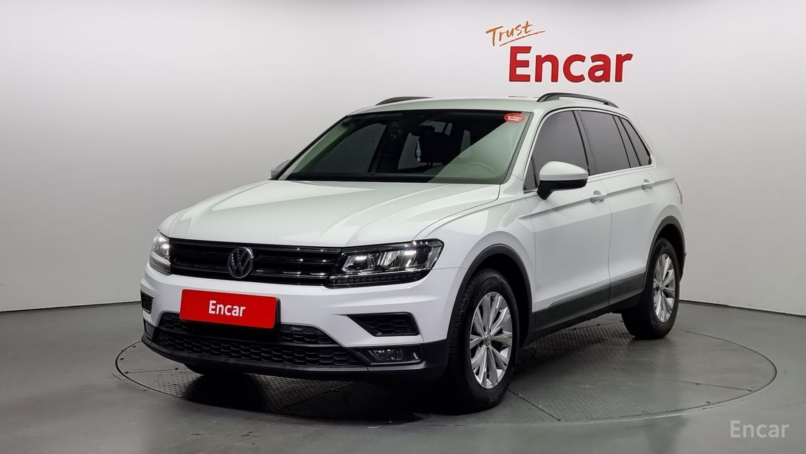 Volkswagen Tiguan - фото 0