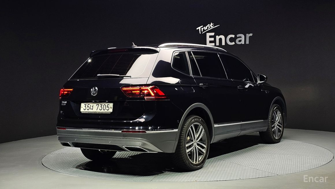 Volkswagen Tiguan - фото 1