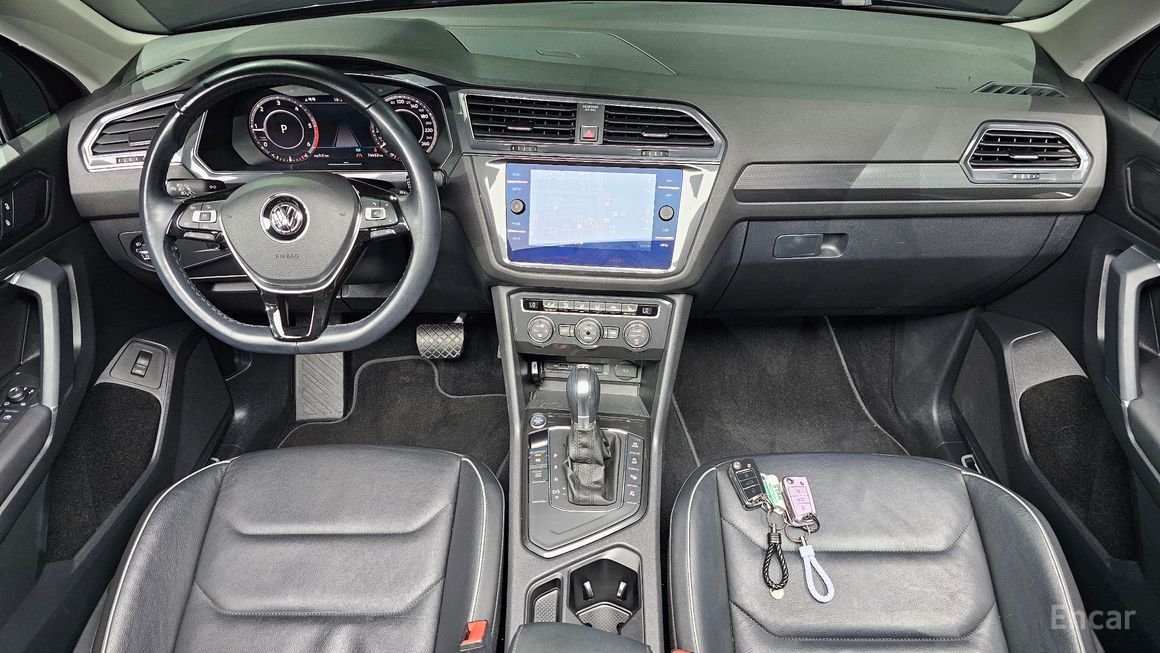 Volkswagen Tiguan - фото 6