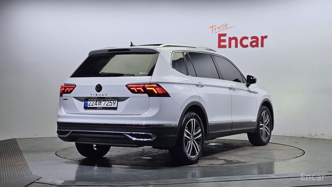 Volkswagen Tiguan - фото 1