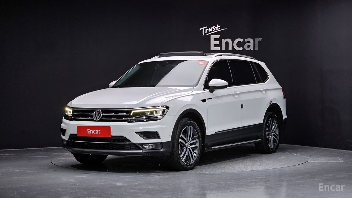 Volkswagen Tiguan - фото 0