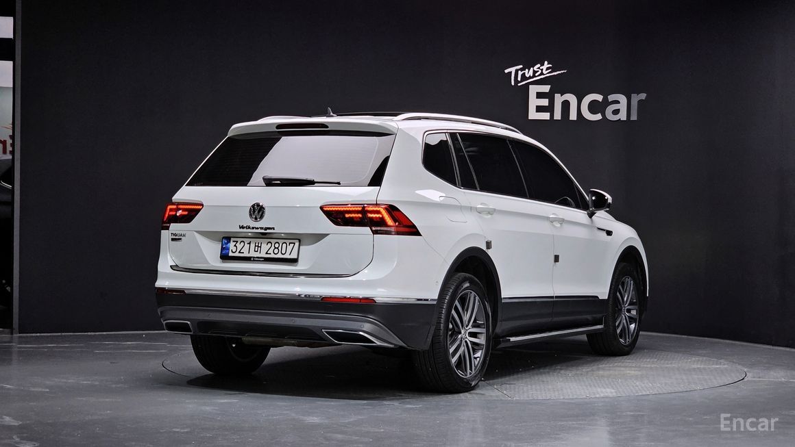 Volkswagen Tiguan - фото 1