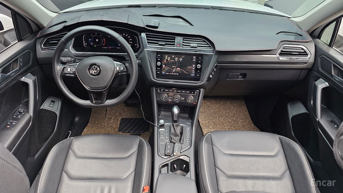 Volkswagen Tiguan - фото 6