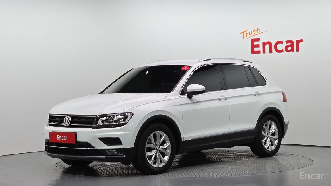 Volkswagen Tiguan - фото 0