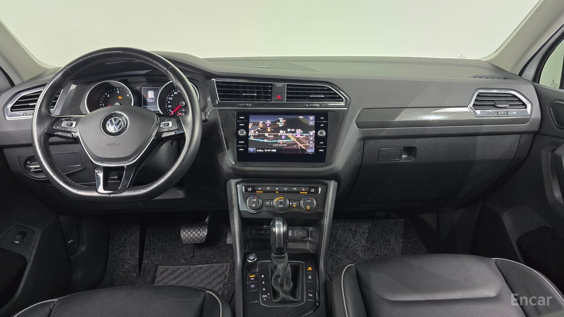 Volkswagen Tiguan - фото 6