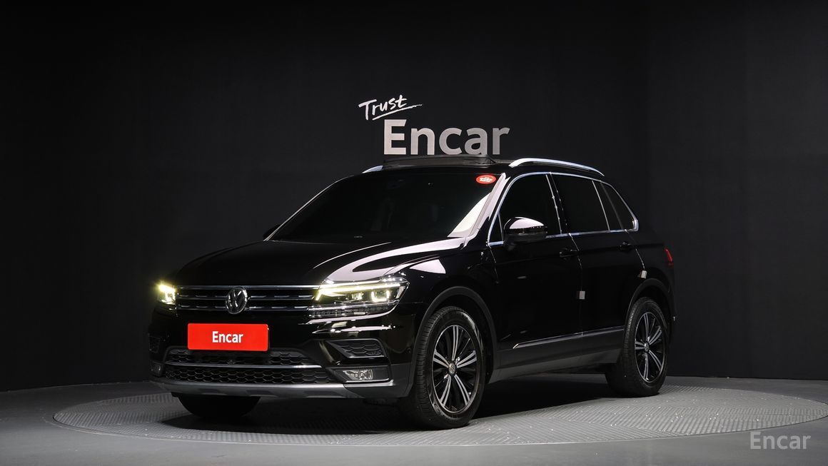 Volkswagen Tiguan - фото 0