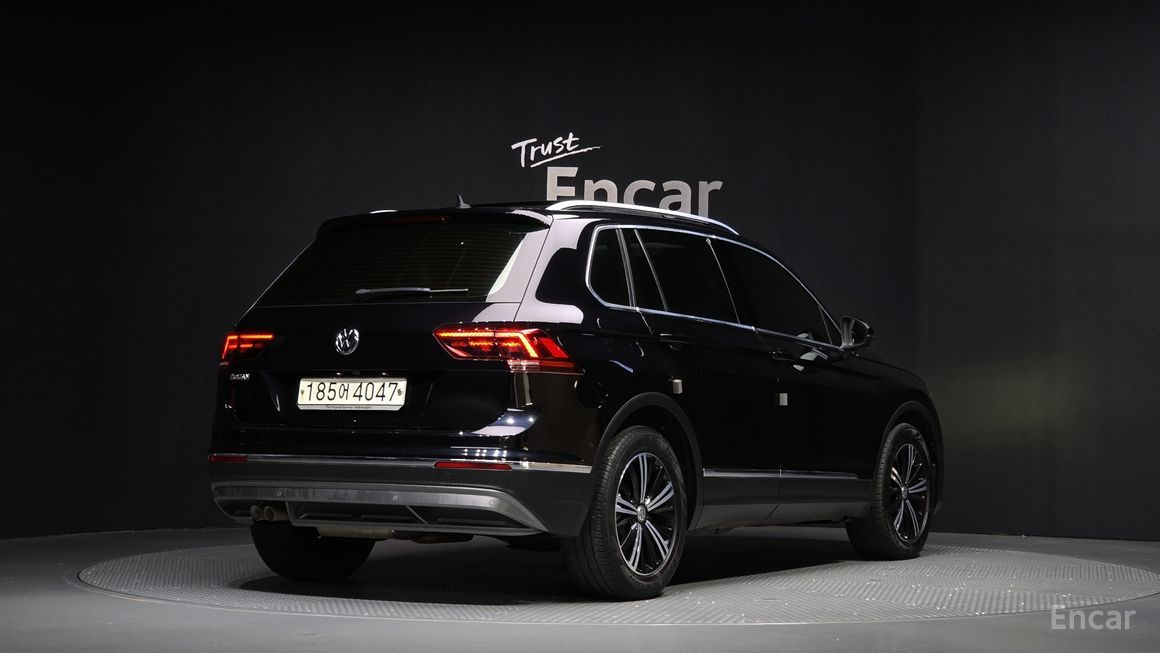 Volkswagen Tiguan - фото 1