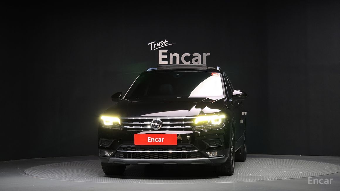 Volkswagen Tiguan - фото 2