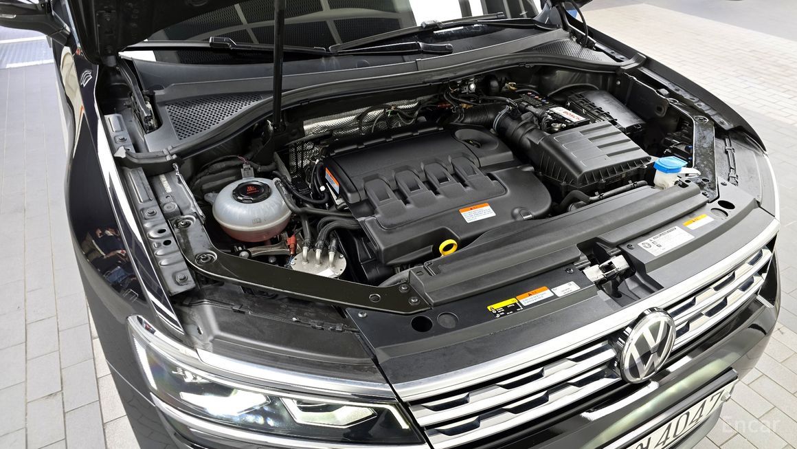 Volkswagen Tiguan - фото 5