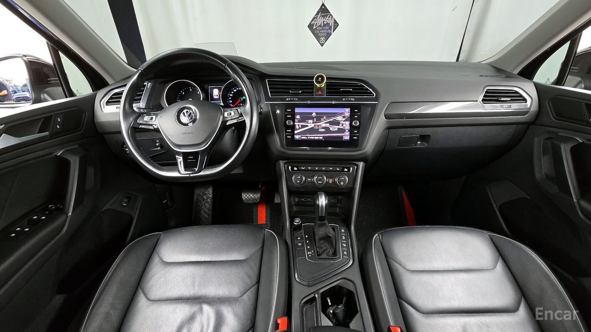 Volkswagen Tiguan - фото 6