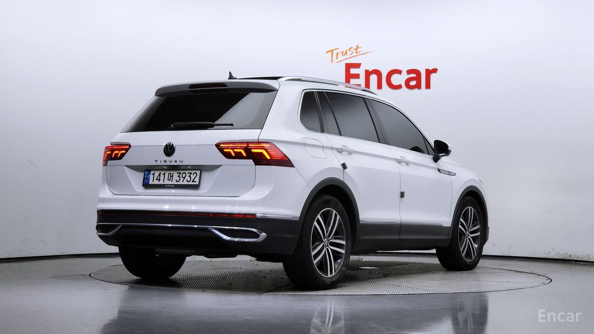 Volkswagen Tiguan - фото 1