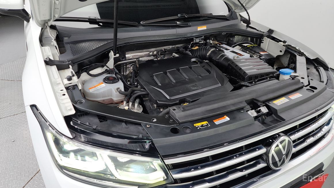 Volkswagen Tiguan - фото 5