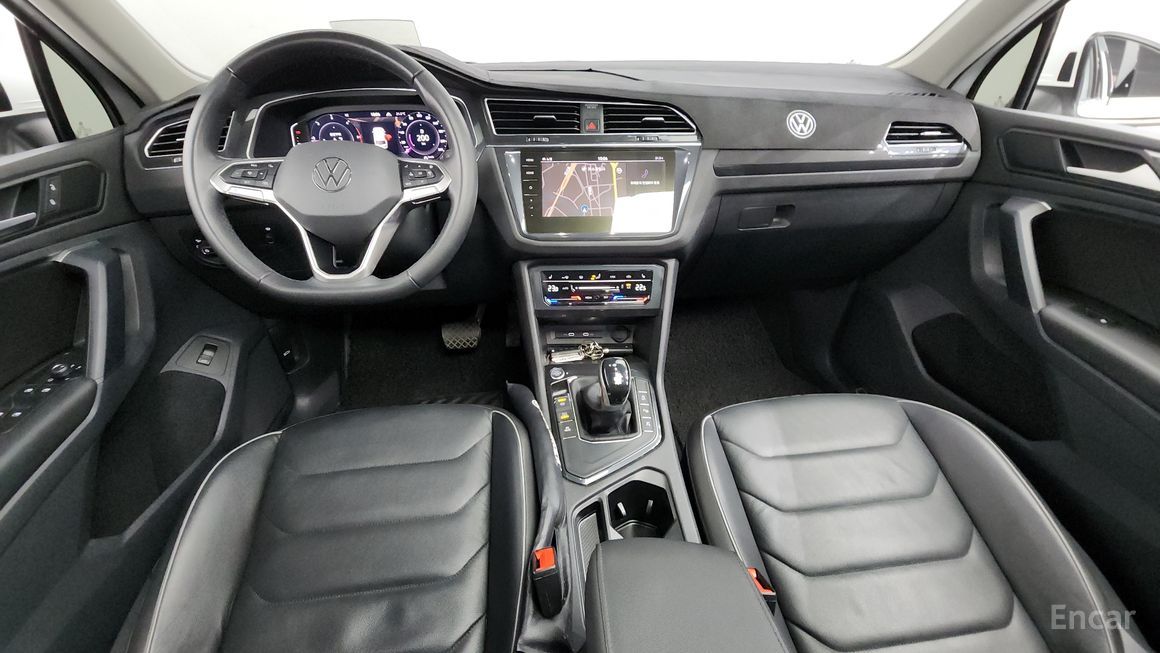 Volkswagen Tiguan - фото 6