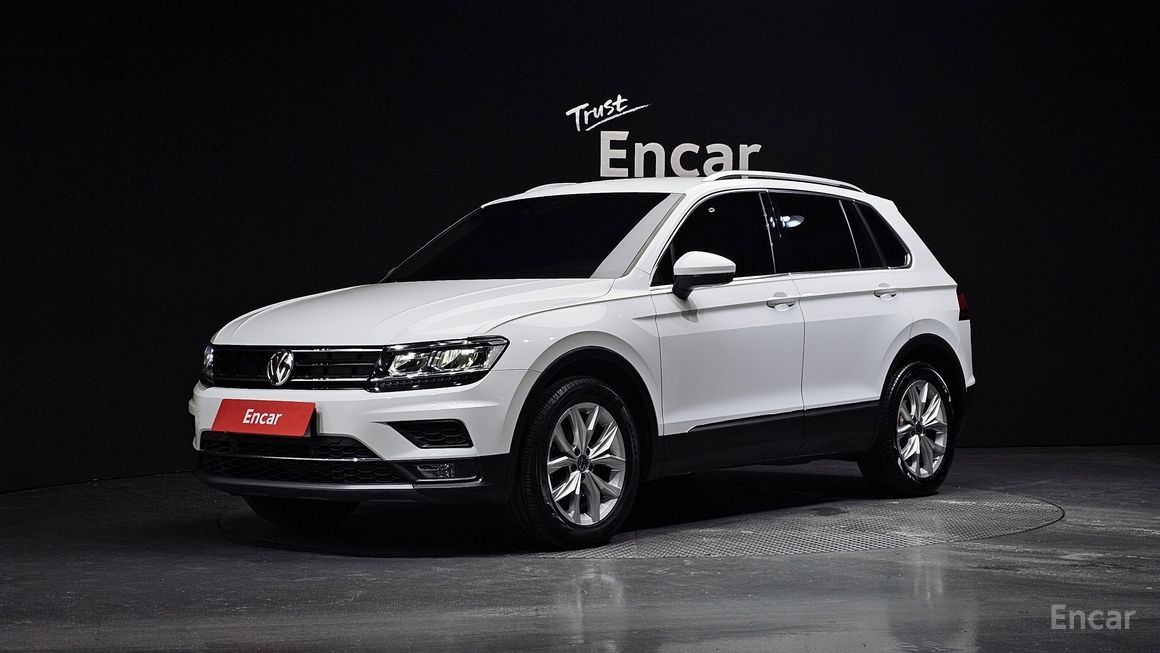 Volkswagen Tiguan - фото 0