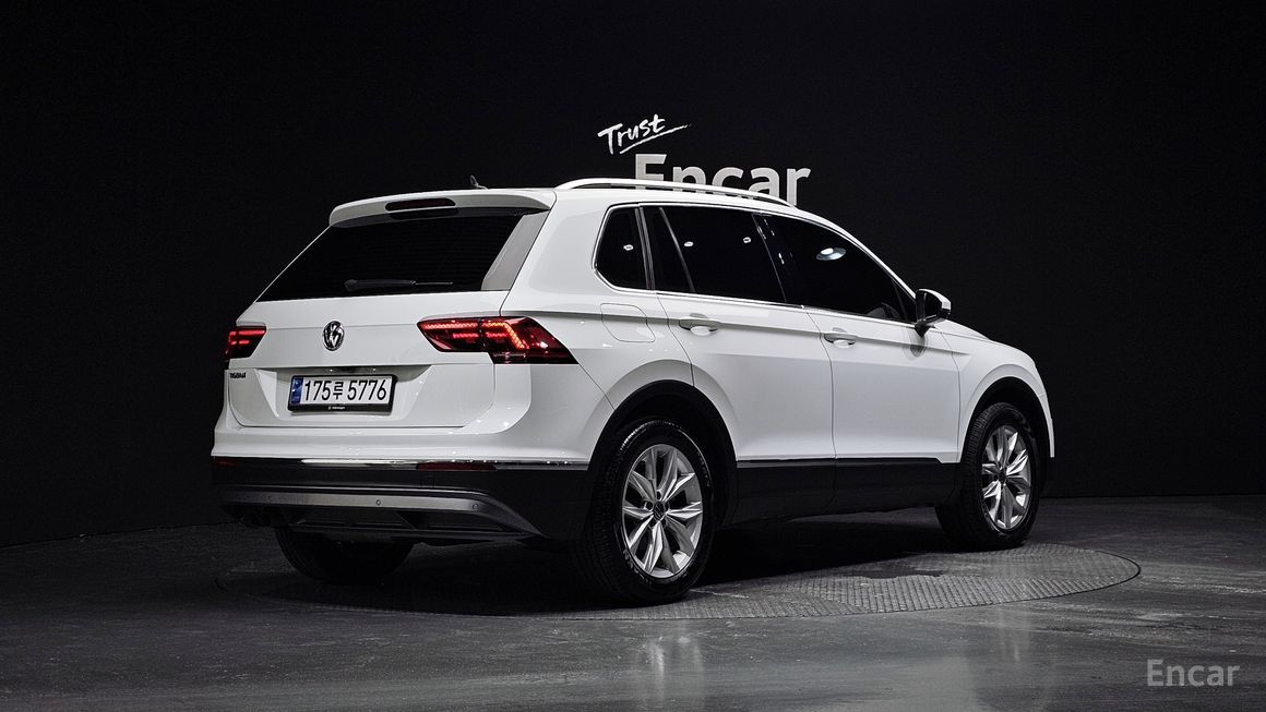 Volkswagen Tiguan - фото 1