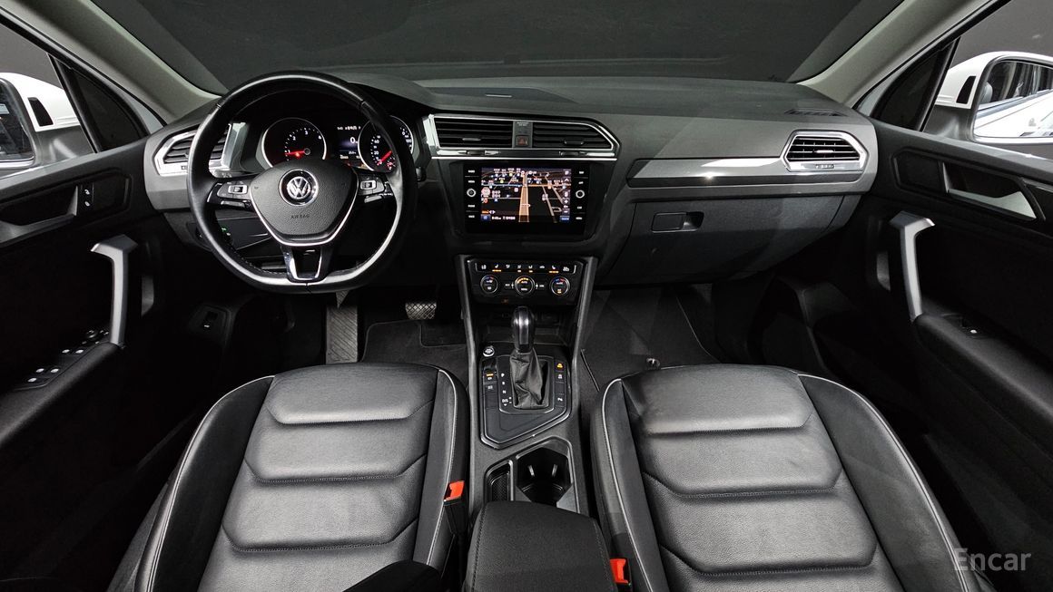 Volkswagen Tiguan - фото 6