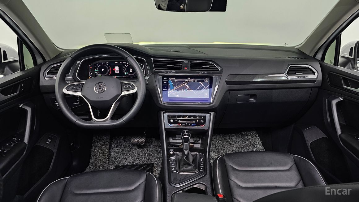 Volkswagen Tiguan - фото 6