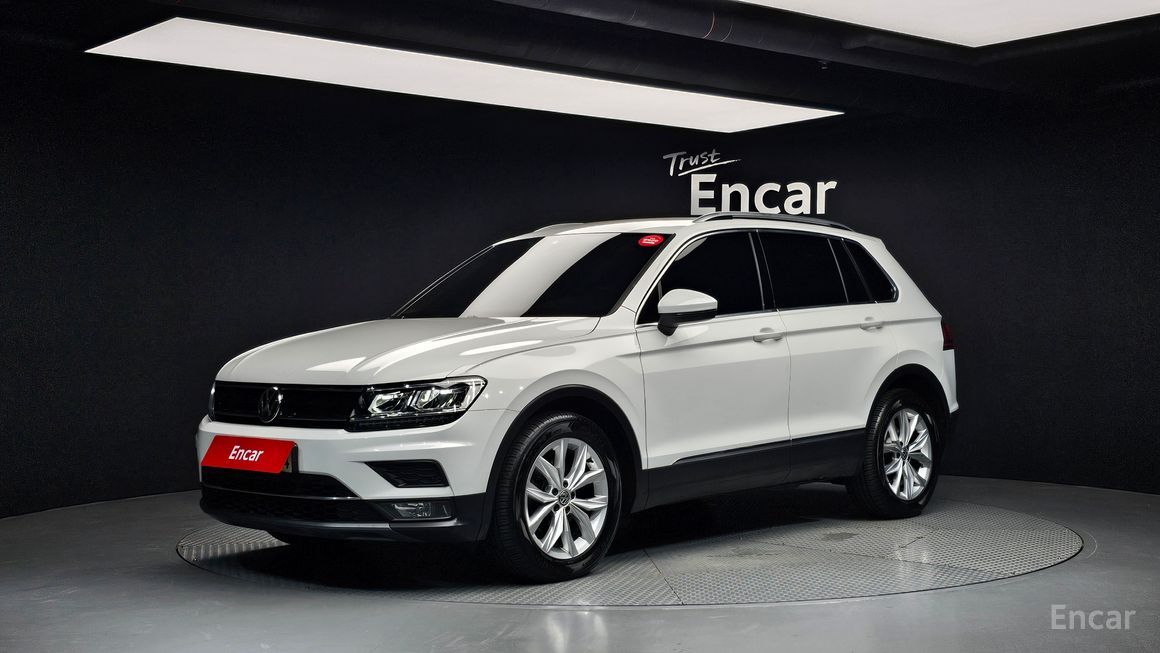Volkswagen Tiguan - фото 0