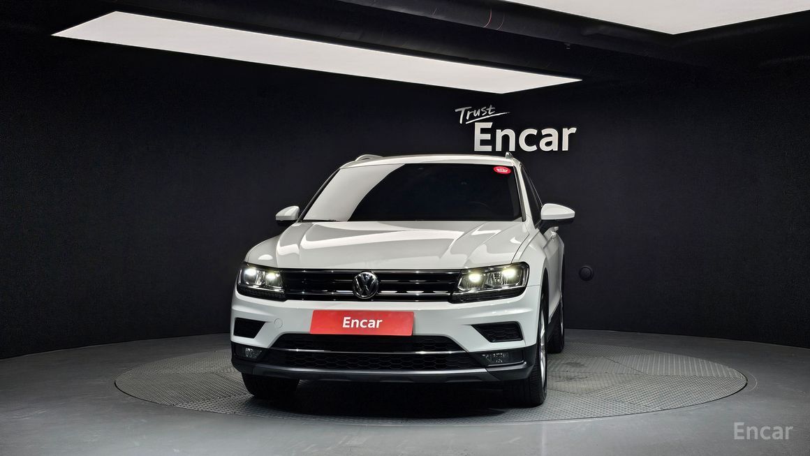 Volkswagen Tiguan - фото 2