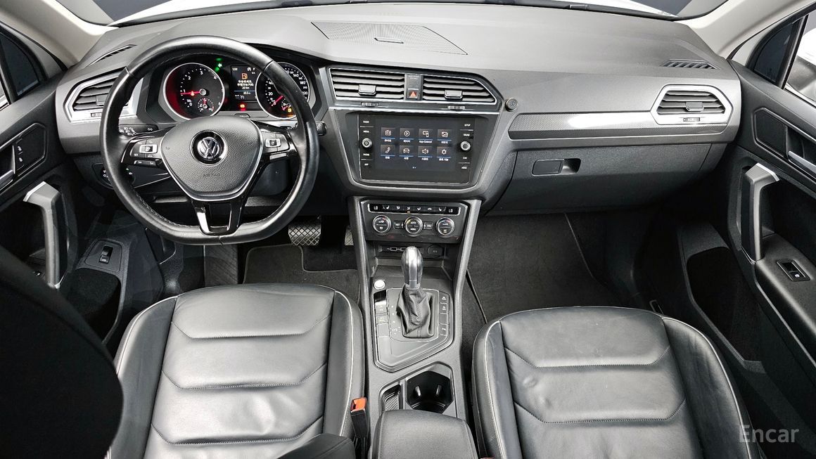 Volkswagen Tiguan - фото 6