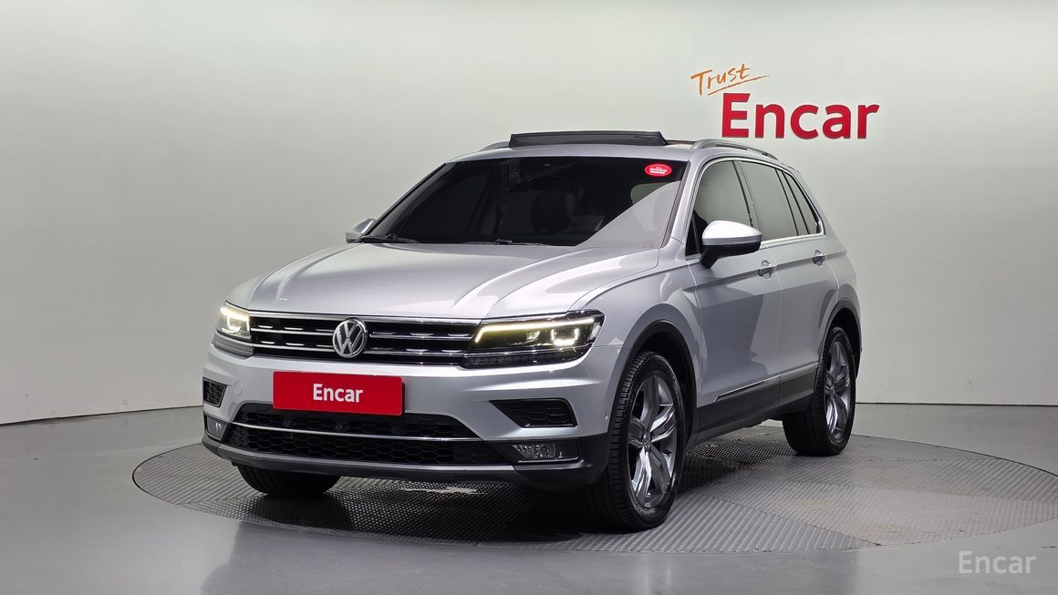 Volkswagen Tiguan - фото 0