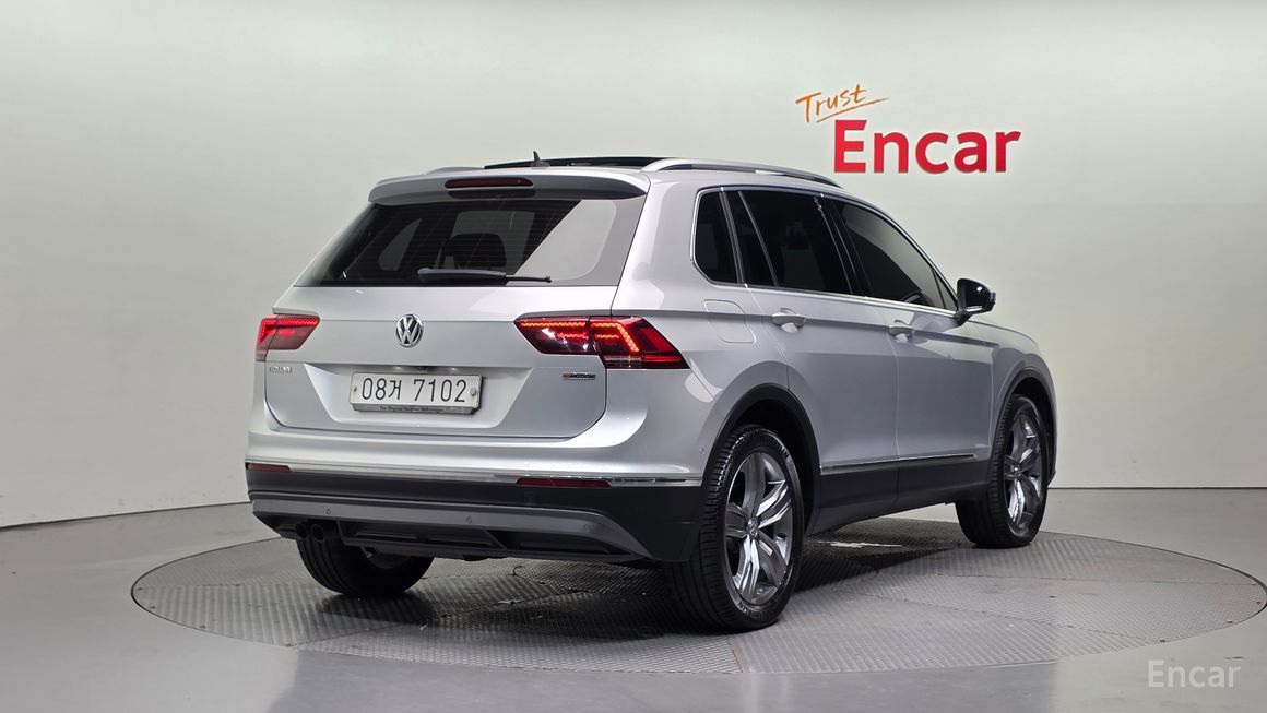 Volkswagen Tiguan - фото 1