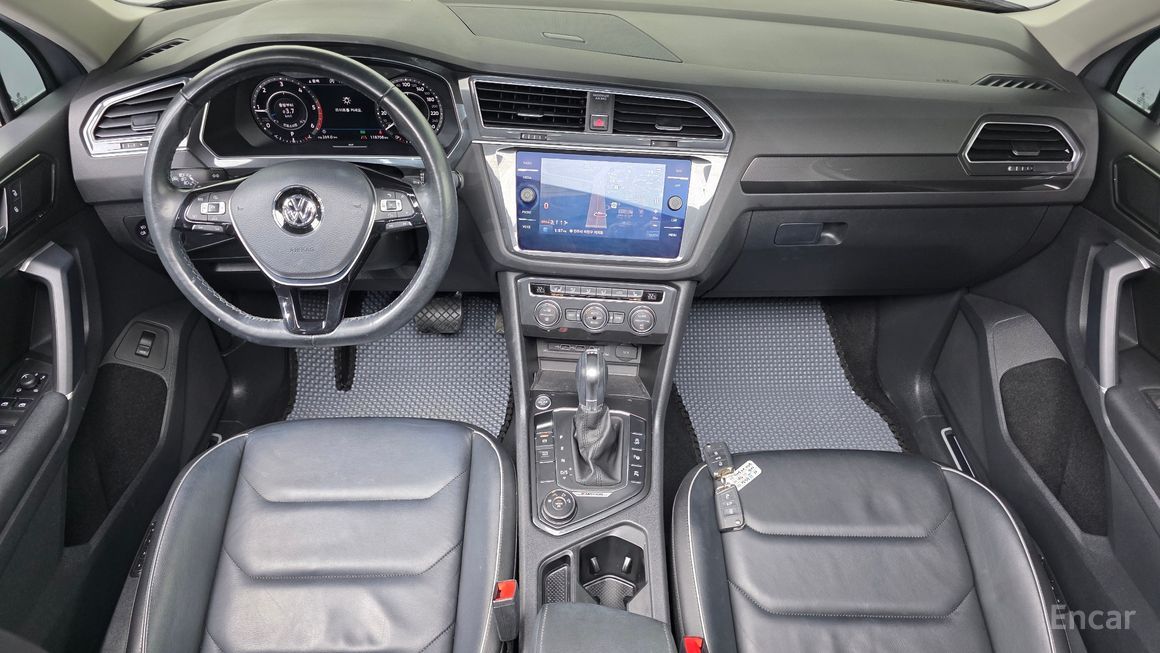 Volkswagen Tiguan - фото 6