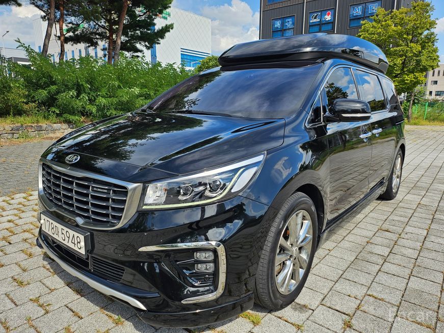 Kia Carnival - фото 1