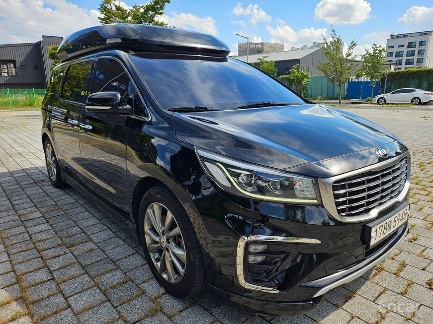 Kia Carnival - фото 2