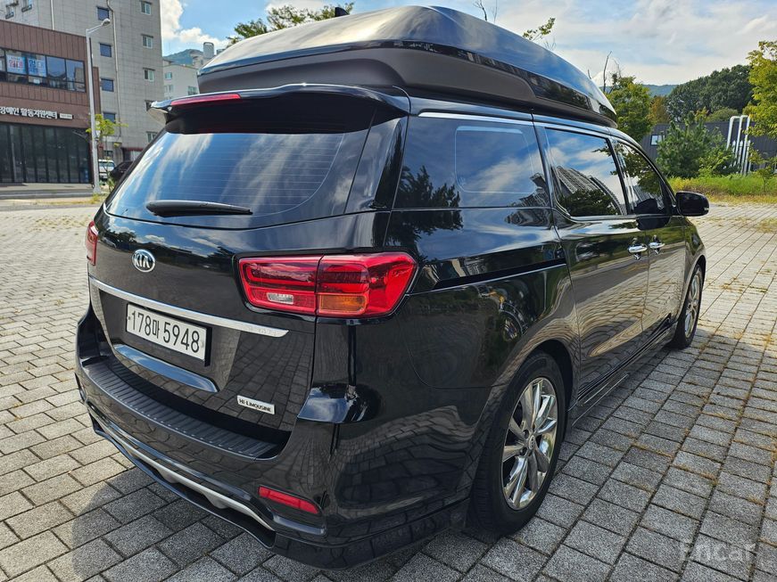 Kia Carnival - фото 6