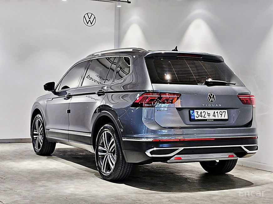 Volkswagen Tiguan - фото 1