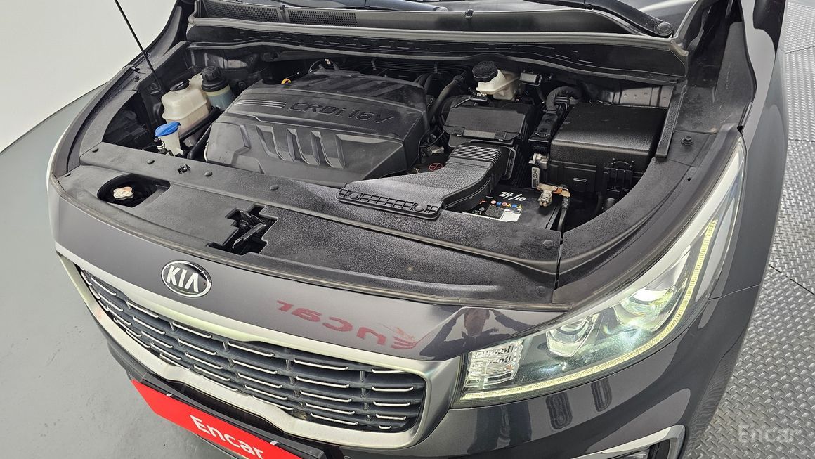 Kia Carnival - фото 5