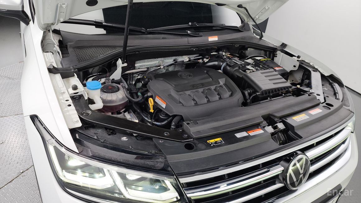 Volkswagen Tiguan - фото 5