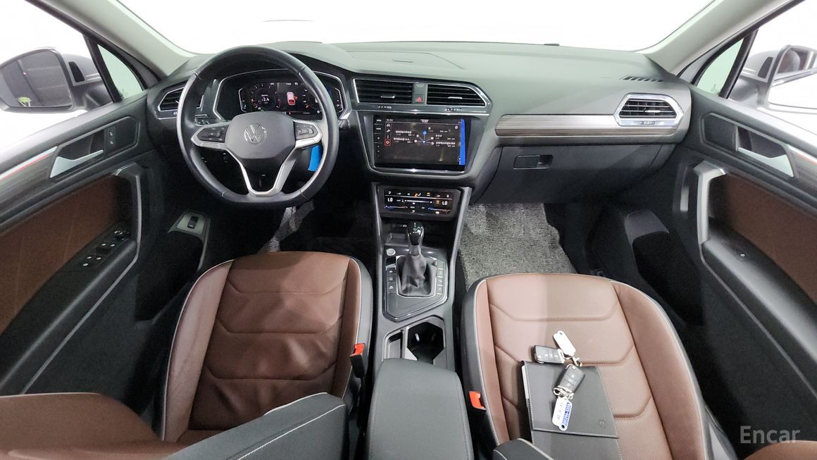 Volkswagen Tiguan - фото 6
