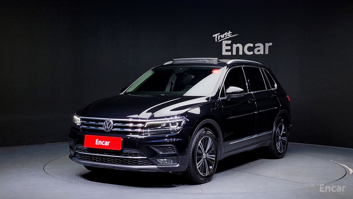 Volkswagen Tiguan - фото 0