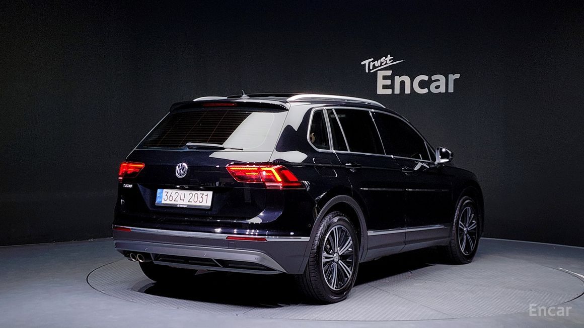 Volkswagen Tiguan - фото 1