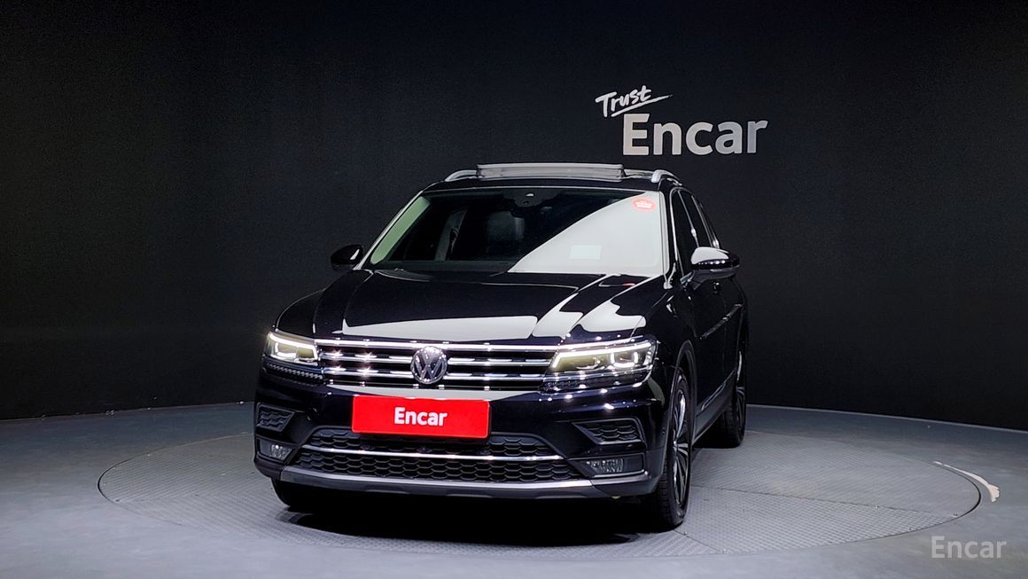 Volkswagen Tiguan - фото 2