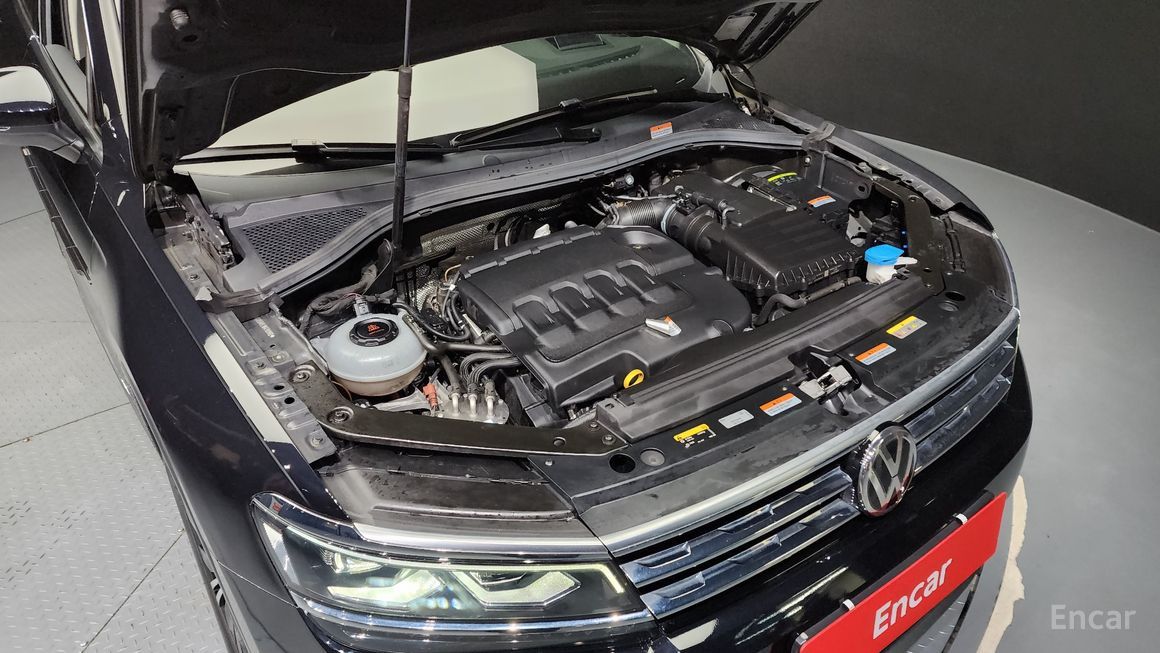 Volkswagen Tiguan - фото 5