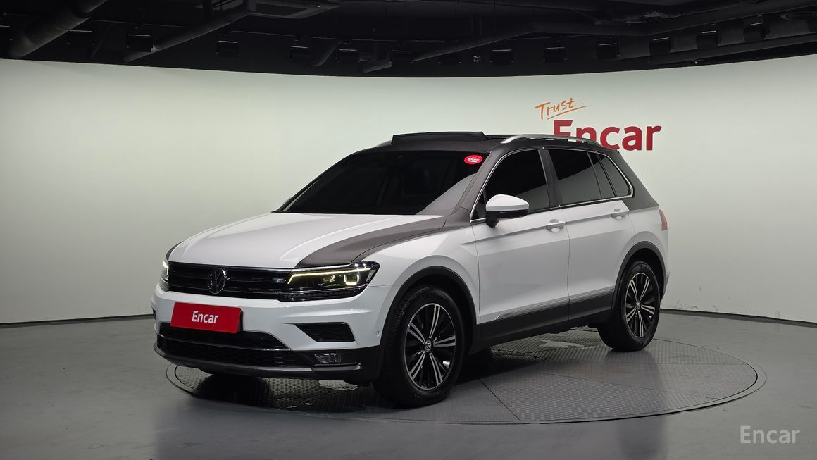 Volkswagen Tiguan - фото 0