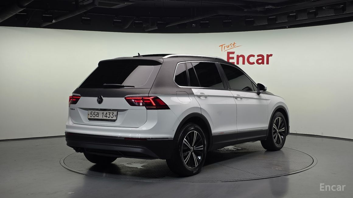 Volkswagen Tiguan - фото 1