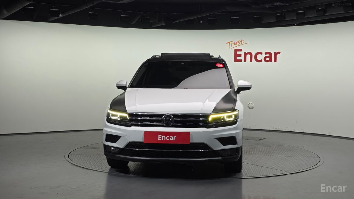 Volkswagen Tiguan - фото 2