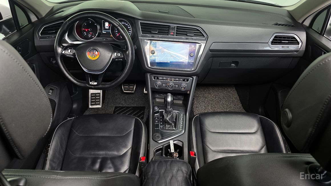 Volkswagen Tiguan - фото 6