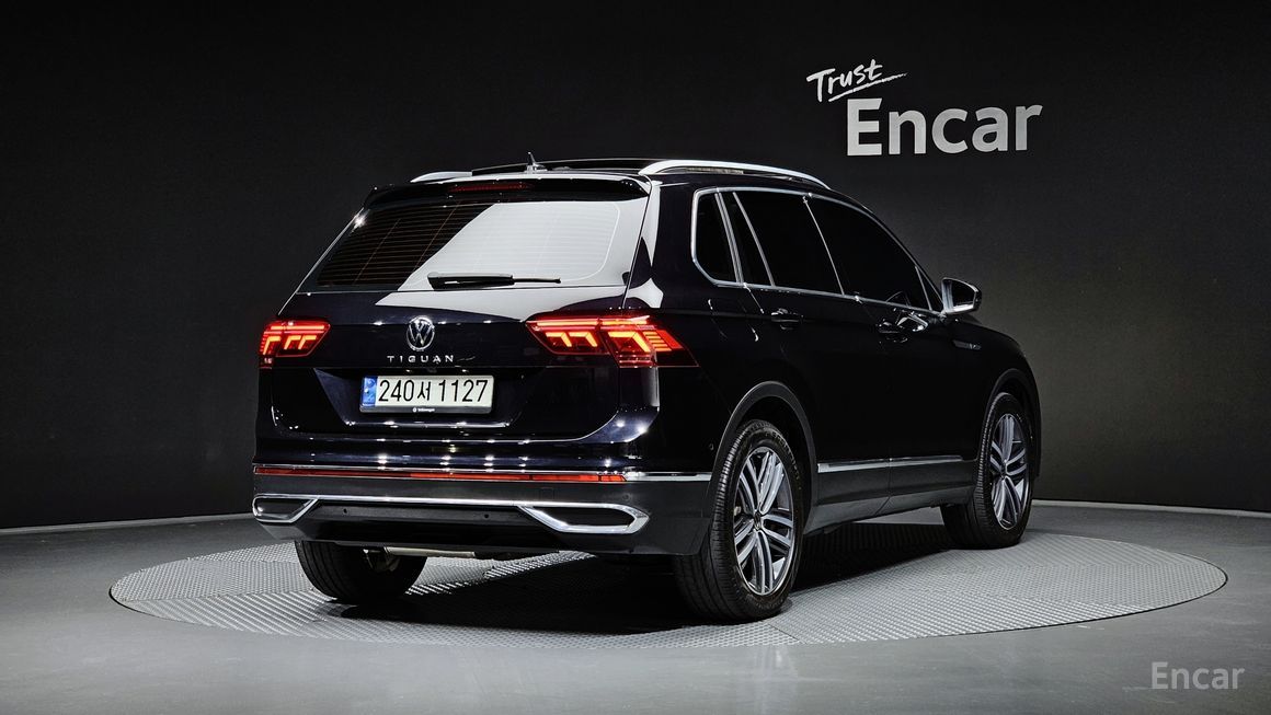Volkswagen Tiguan - фото 1