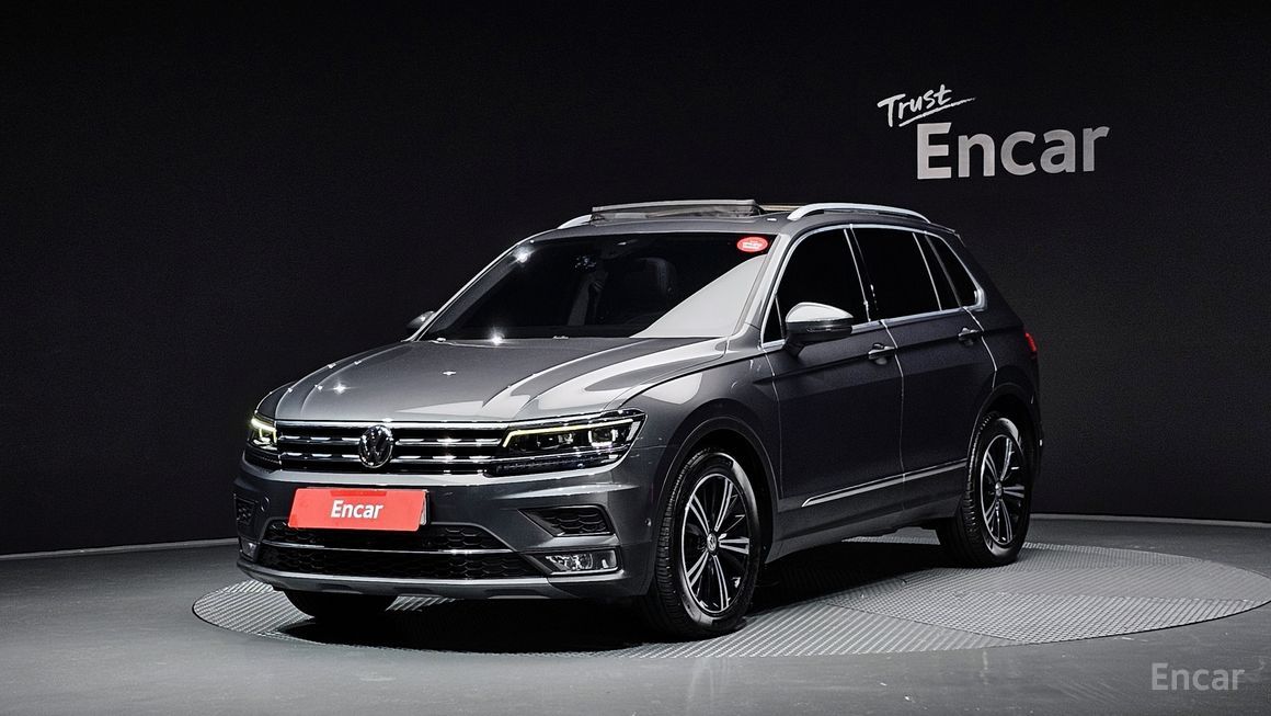 Volkswagen Tiguan - фото 0